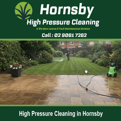 A patio area with pressure washing equipment in Hornsby
